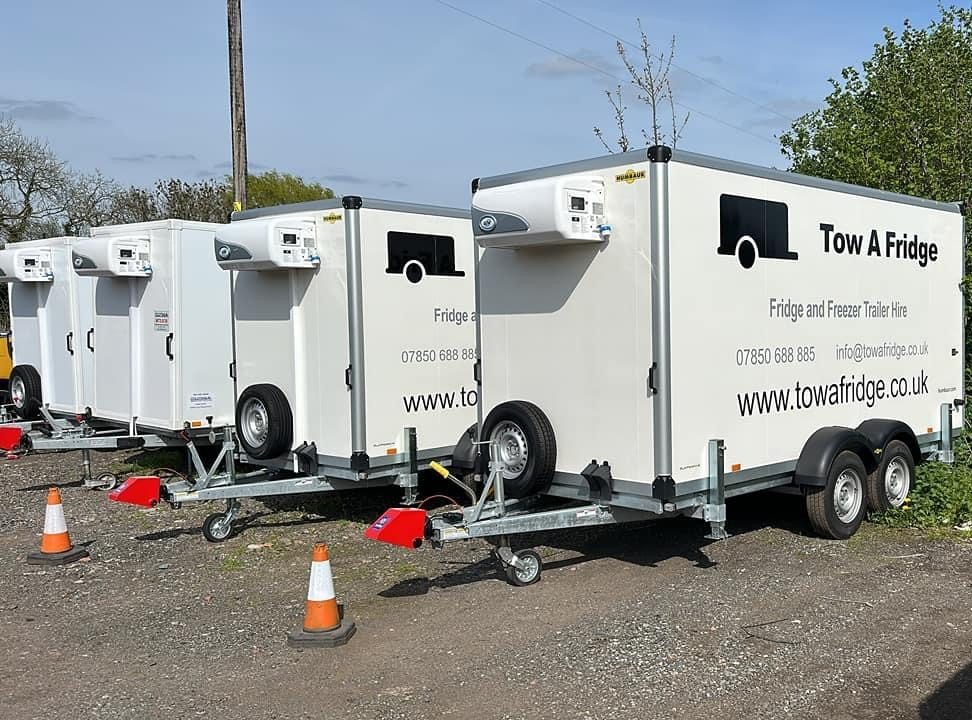 Row of fridge and freezer trailers for hire